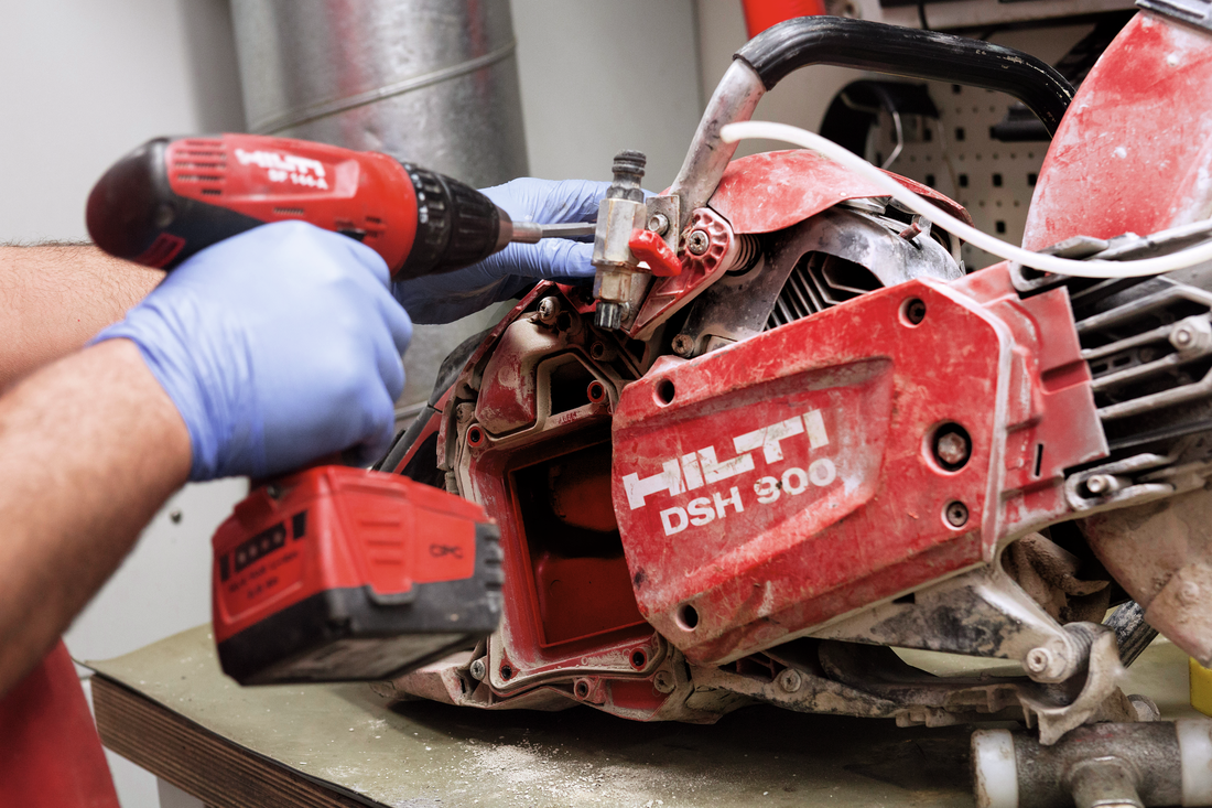 Power tool being serviced