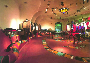 A retail unit is transformed into a rounded caravan swathed in Moroccan-Moorish colours