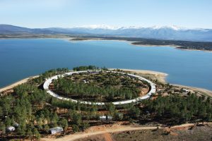Inscribed as a perfect circle in the landscape, the building has the powerful quality of land art