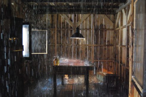 Le Refuge, an artwork by Stéphane Thidet where it rains inside a workshed
