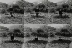 Keith Arnatt digs himself into a hole, progressively disappearing into the earth