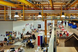 Ground floor studios of the Bath Spa Schools of Art and Design can be seen from the first floor gangways above