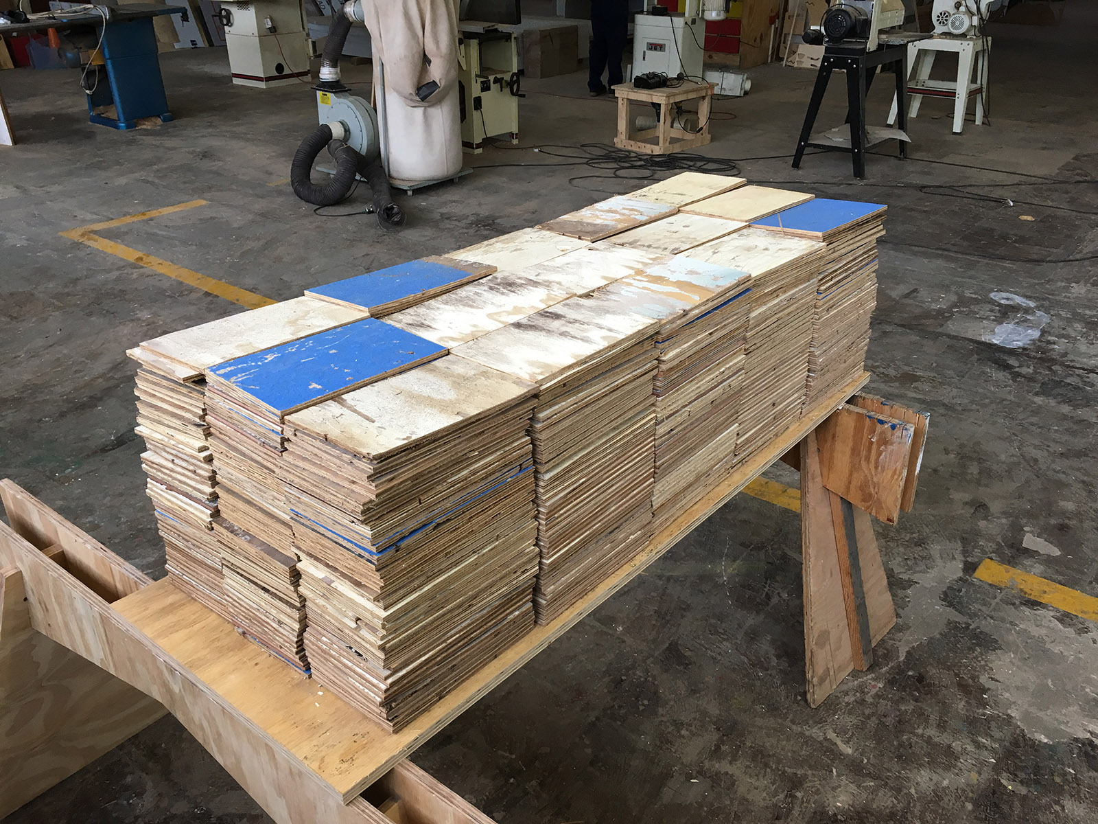 Stacks of shingles made of reused floorboards