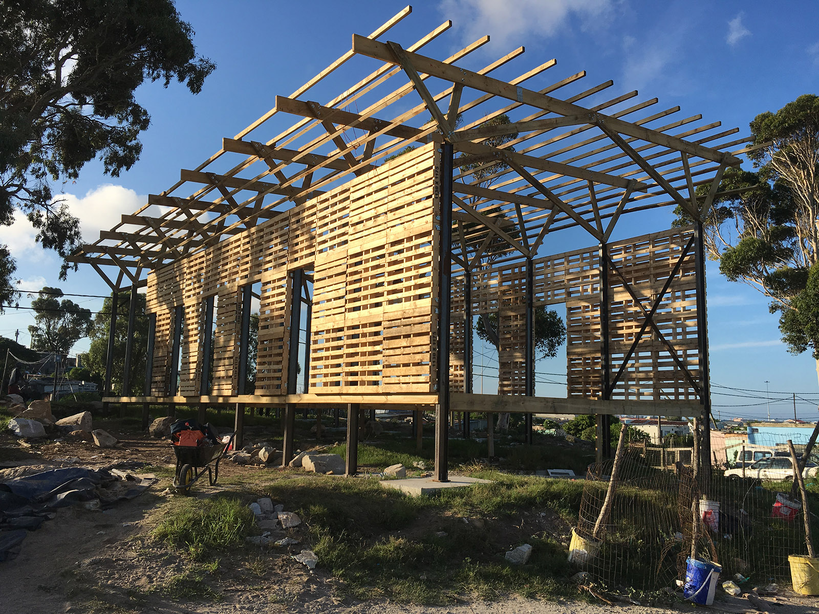 Walmer Crèche by Simon Galland with LYT Architecture under construction, showing the timber pallets