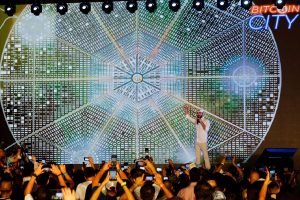 2H76YF9 El Salvador's president Nayib Bukele speaks at the closing party of the Bitcoin Week where he announced the plan to build the first Bitcoin City in the world, in Teotepeque, El Salvador November 20, 2021. REUTERS/Jose Cabezas