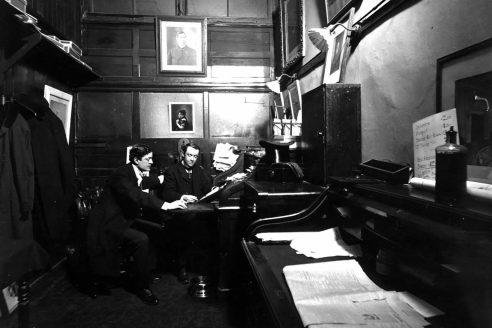 Two clerks in a 19th century Manhattan office
