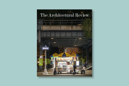Cover of the July/August 2024 issue of the Architectural Review on a blue background. the cover depicts a hotdog stand at night beneath the High Line in New York