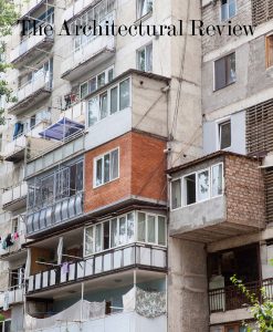 Cover of The Architectural Review’s February 2025 issue, Extensions. The cover depicts a cluster of self-built extensions on a housing block