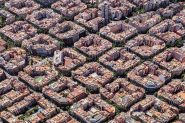Aerial view of typical buildings of Barcelona cityscape from helicopter. top view, Eixample residencial famous urban grid