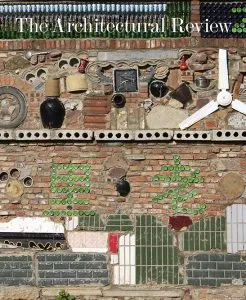 Cover image of The Architectural Review May 2025 Issue on Circularity depicts a wall in China constructed from reused materials including bottles and a ceiling fan