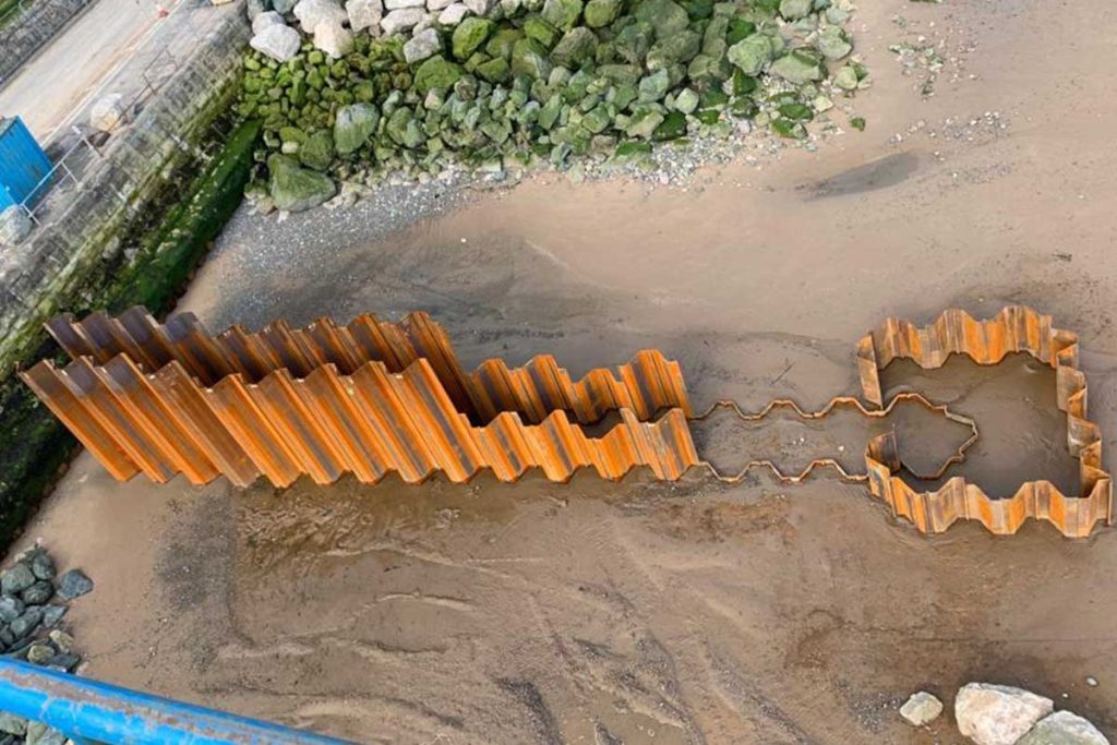 Historic north Wales sea wall strengthened by sheet piling works