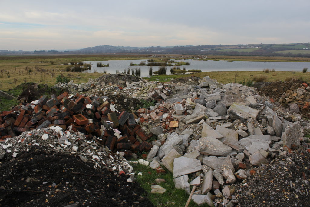 Explain two ways how lockdown could have led to more instances of illegal dumping picture