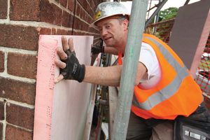 Generic workers Insulation bricks Green Deal retrofit scaffolding Thextons worker house