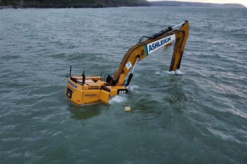 Faulty excavator swallowed by ocean at £32M Aberaeron Coastal Defence ...